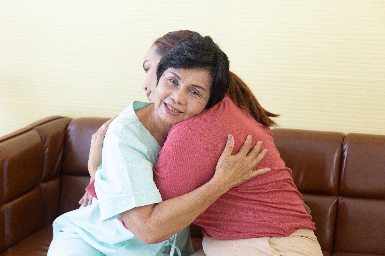Family members embracing with warmth and care